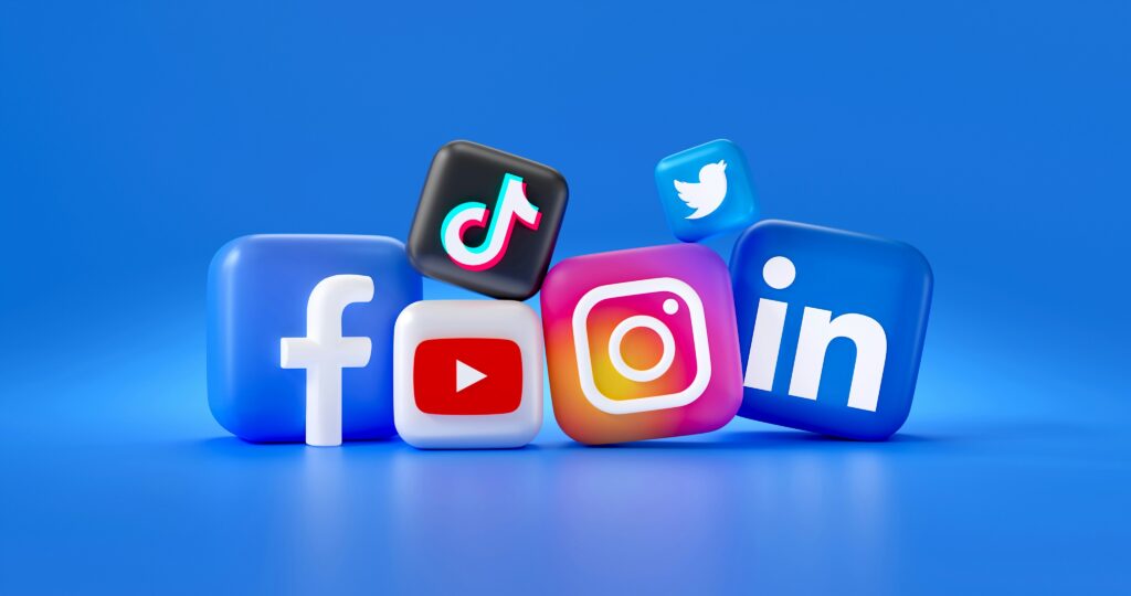 Social media icons (Facebook, TikTok, Youtube, Instagram, X, Linkedin)